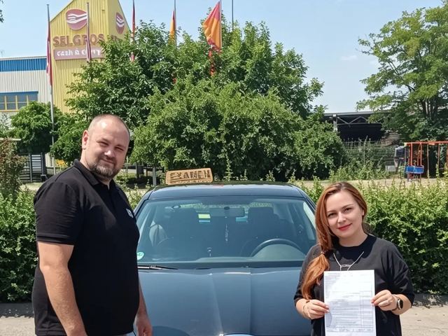 Examen promovat
